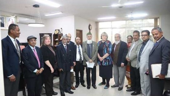 ASCE and IEB leaders met to sign agreement of cooperation. Pictured are 13 people in a room in Dhaka. 