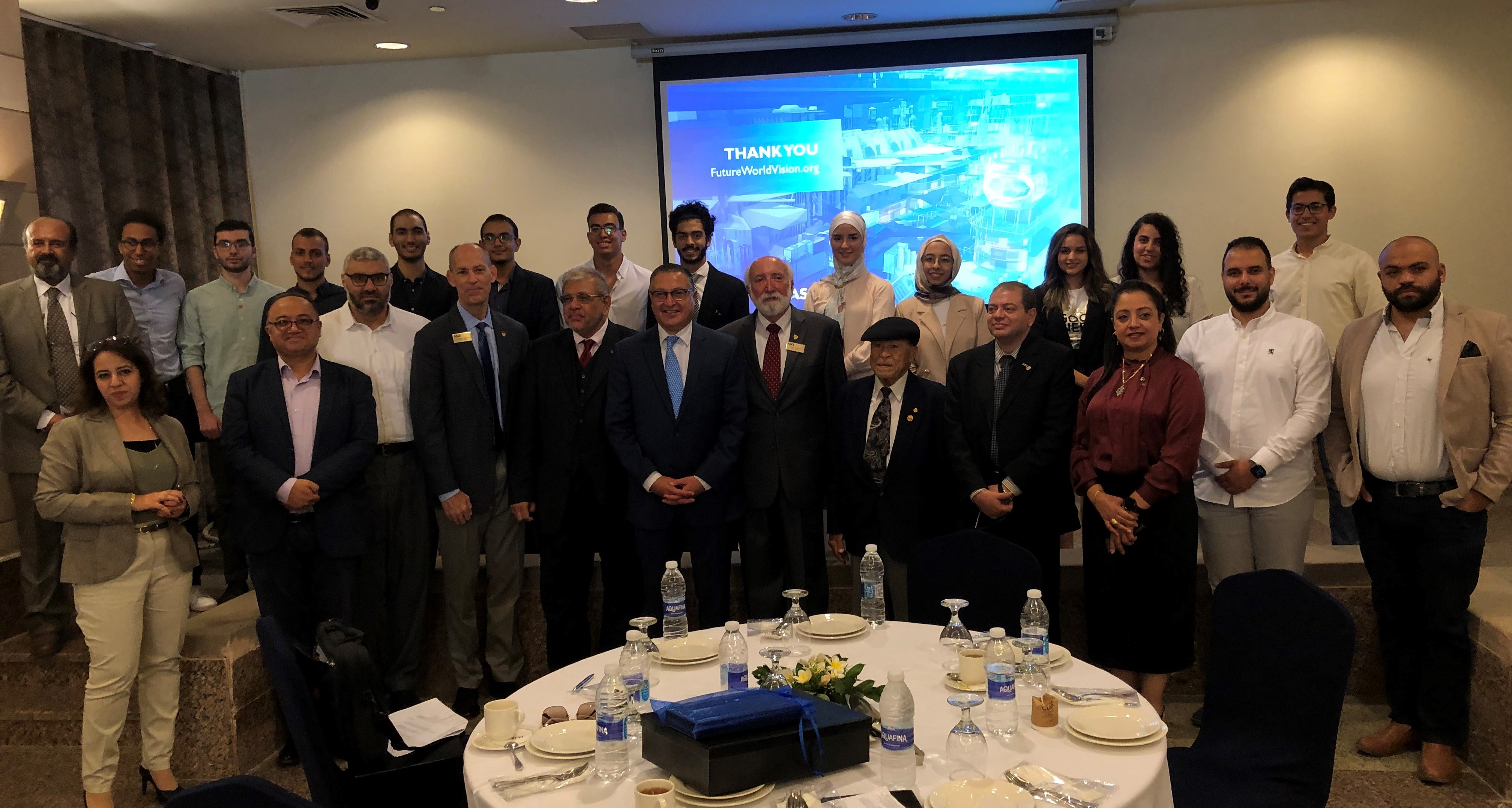 Meet the ASCE President at American University in Cairo Student Chapters event. Pictured are 25 people standing in a meeting room at American University in Cairo. 
