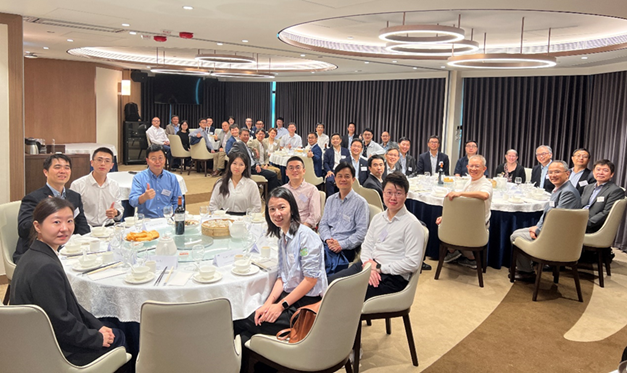 Greater China Section Luncheon. Pictured are 42 people sitting at tables in a banquet hall. 