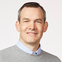 Man in gray sweater