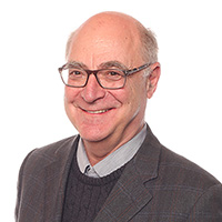 man in suit smiling