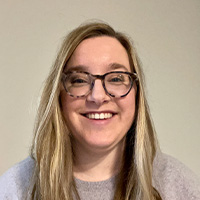 woman in gray sweater 