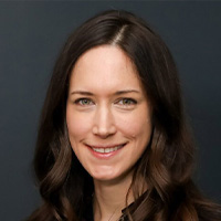Woman in dark blouse