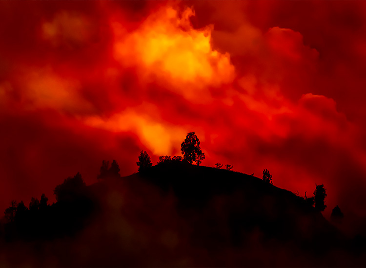 Landscape on fire at night.