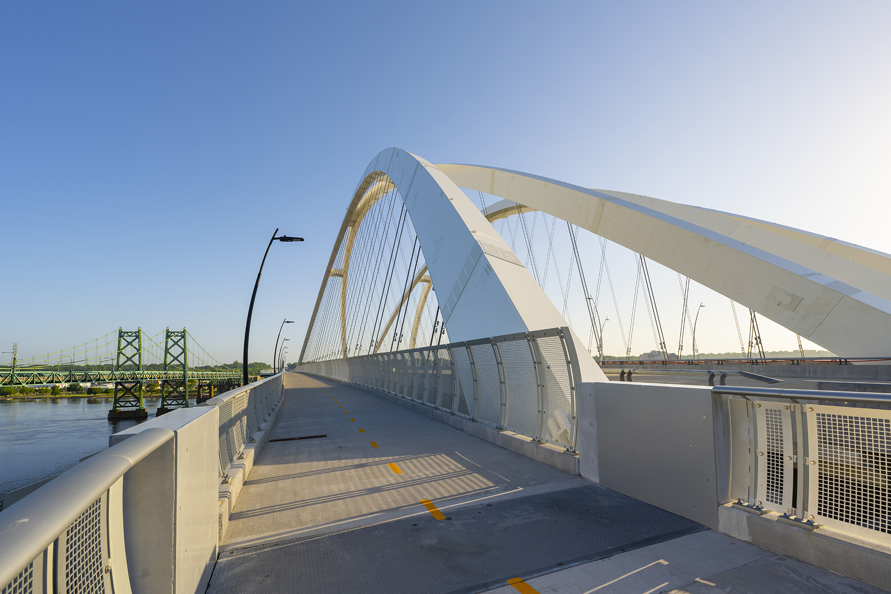 Photo shows a walkway for pedestrians and cyclists.