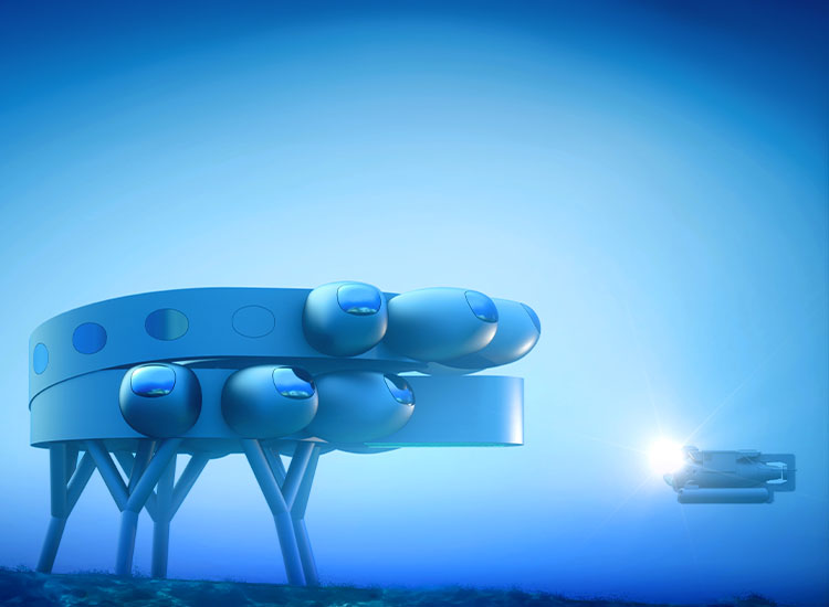 The rendering shows a modular underwater laboratory with multiple stories and large protuberances. 