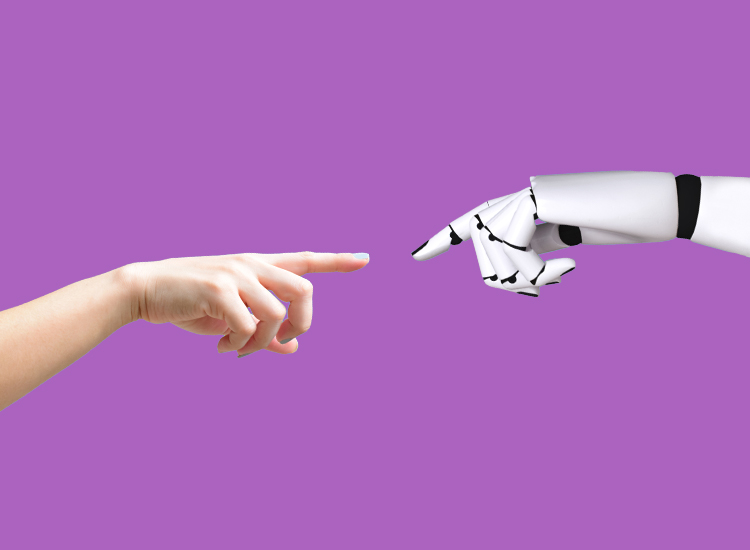 A human hand and a robotic hand are almost reach for each other. 