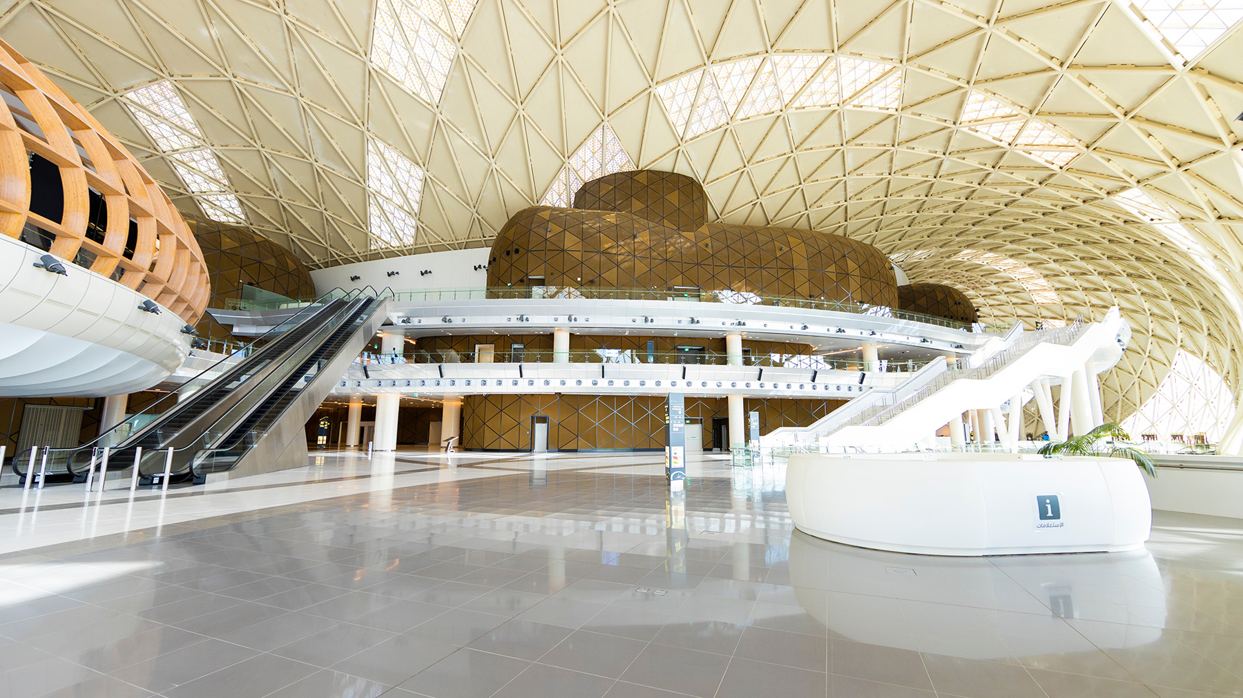 The photograph shows the spacious interior of the Lusail Stadium, which will be repurposed for multiple community uses.