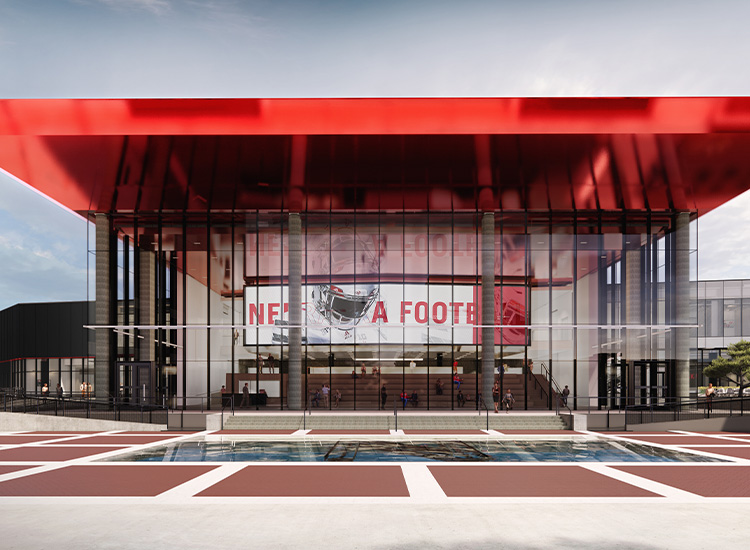 Rendering shows a double-height building with a large red canopy. 
