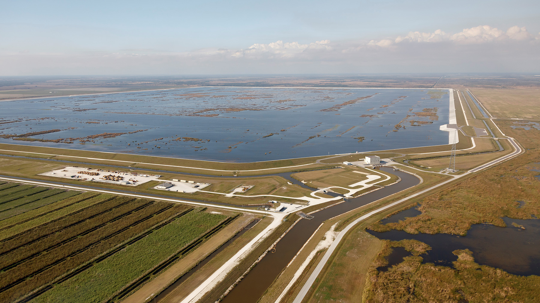 Large, irregularly shaped land mass that has a body of water in its center.