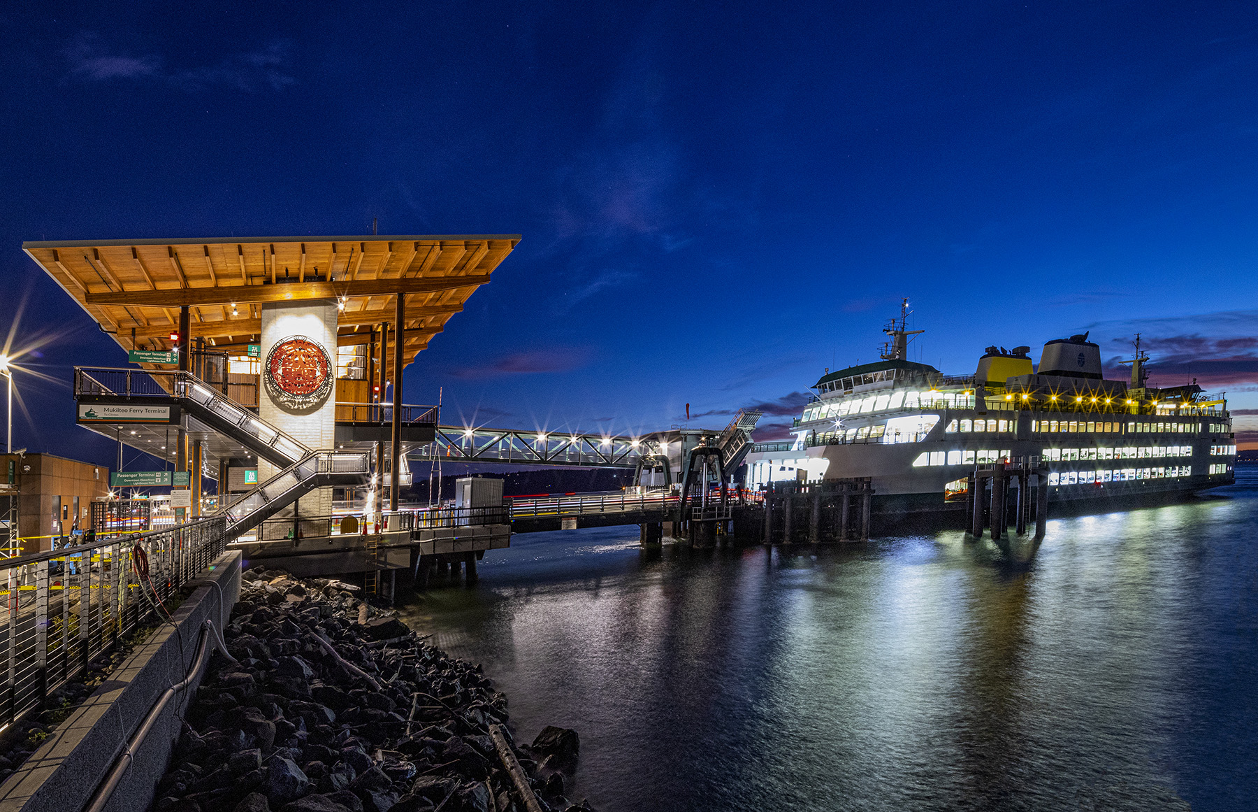 A ferry terminal is shown featuring the main buildings.