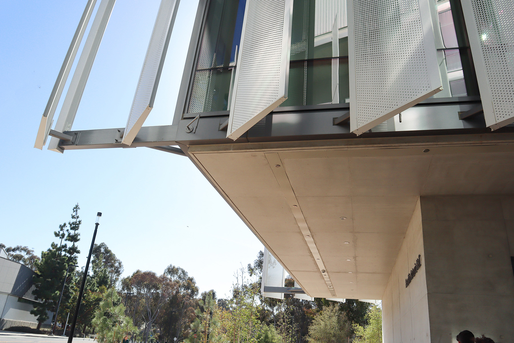 An up-close image of the aluminum sections, called fins, which look like they float off the side of the building.