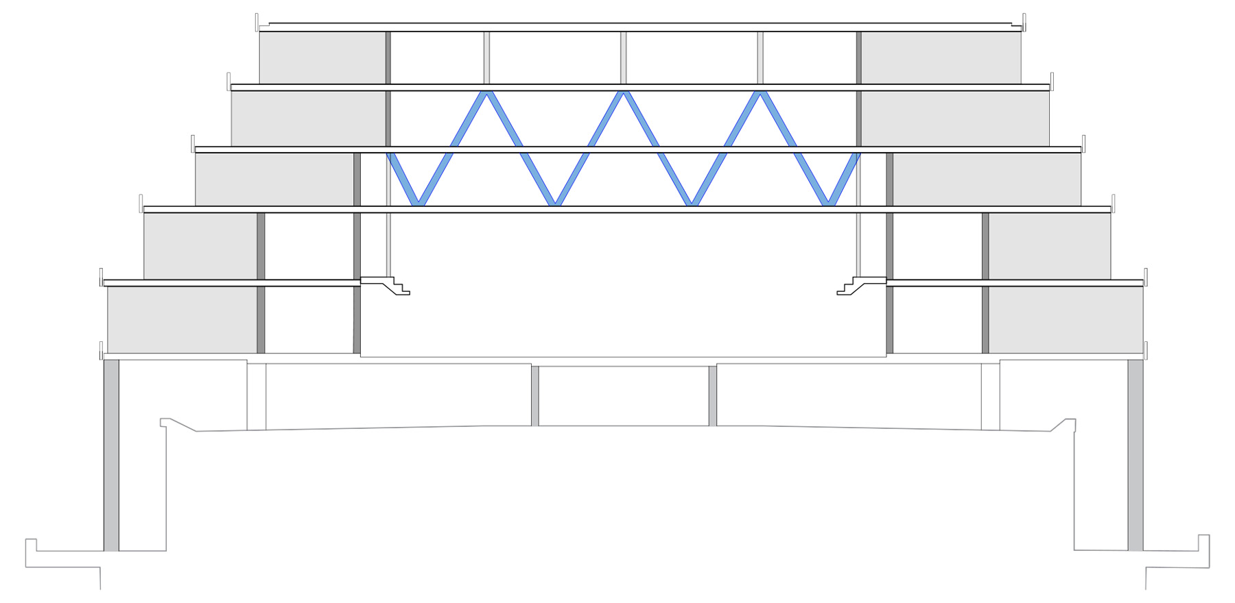 The drawing shows a close-up cutaway view of the steel truss supporting the floors above the two-story gymnasium.