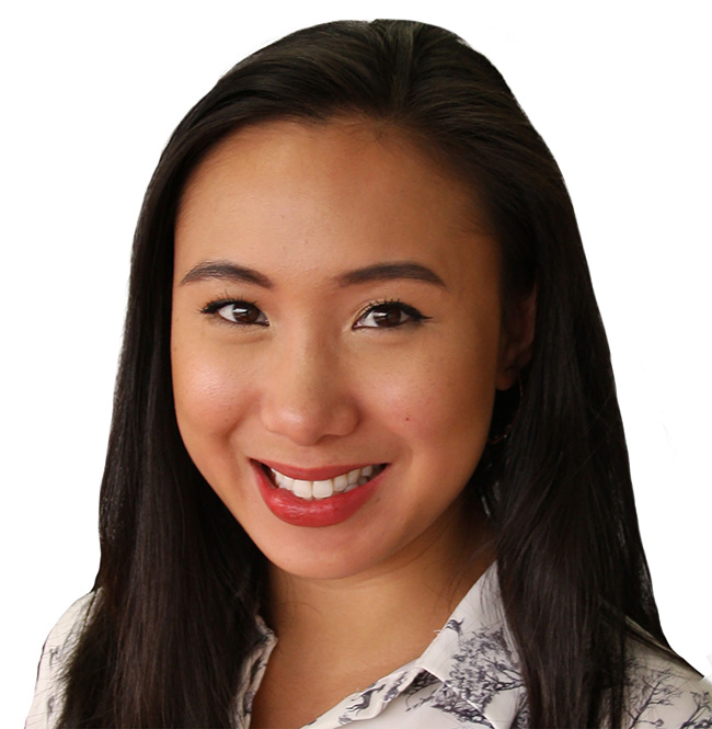 Woman smiles at the camera. 